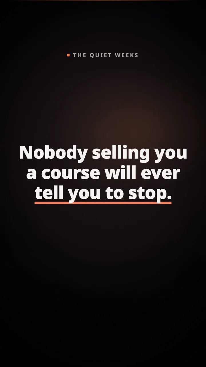 A video frame, white words on near black: “Nobody selling you a course will ever tell you to stop.” The last two words are underlined in coral.